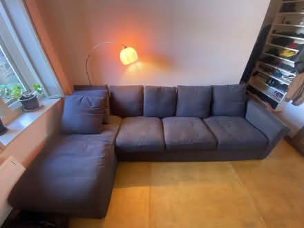 Photo of free Dark Blue L shaped sofa with storage compartment (Kennington SW9) #1