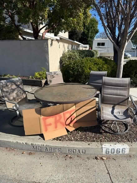 Photo of free Outdoor patio table and chairs (6090 McAbee Road) #1
