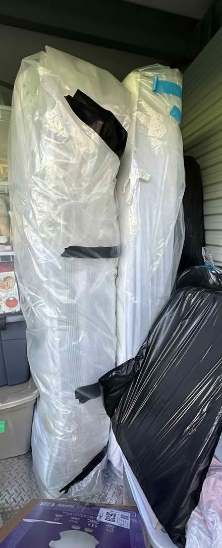 Photo of free 2 twin mattresses - no box springs (Claremont) #1