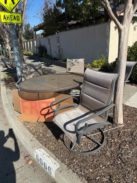 Photo of free Outdoor patio table and chairs (6090 McAbee Road) #2