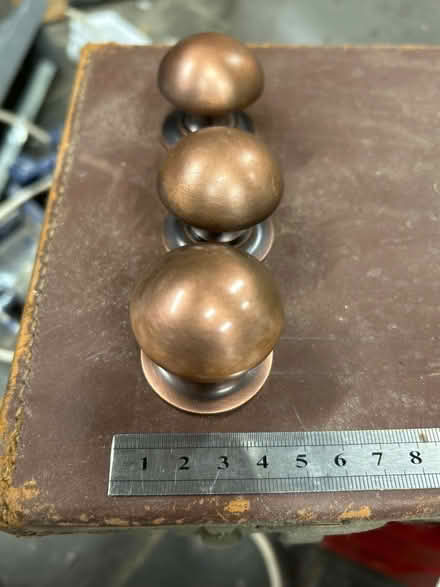Photo of free 3 bronze cabinet knobs (Haldens AL6) #1