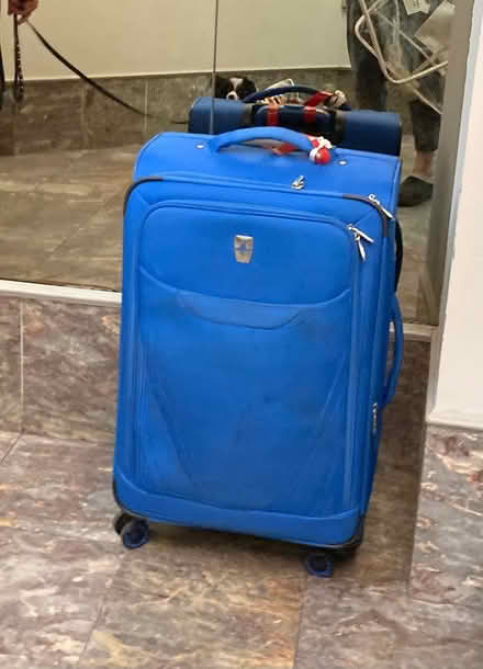 Photo of free Rolling suitcase (Midtown East) #1