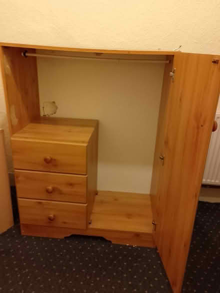 Photo of free Damaged small wood effect wardrobe (Harringay N4) #1