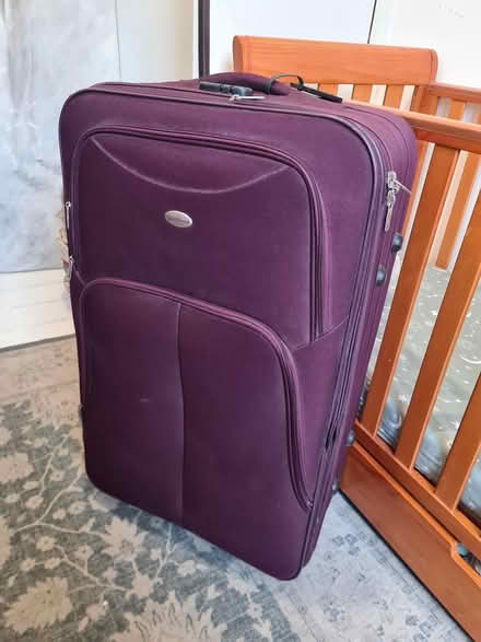 Photo of free Large aubergine suitcase (Forest Gate E7) #1