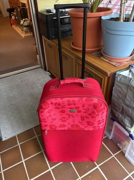 Photo of free Small red suitcase (Far Bletchley MK3) #1