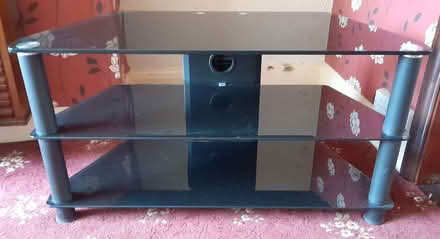 Photo of free Black glass TV stand with shelves – to be collected from I (IP4) #1
