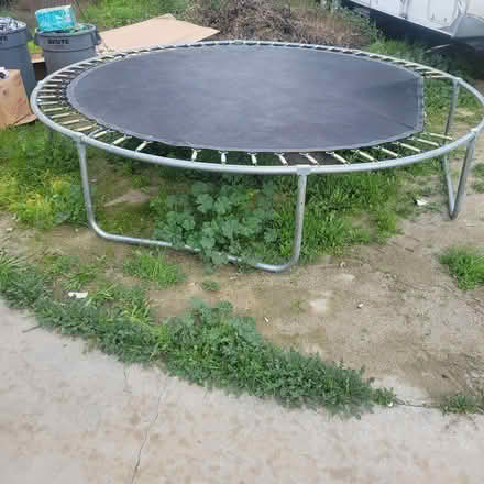 Photo of free 10 foot trampoline damaged (East hemet / new chicago st) #1