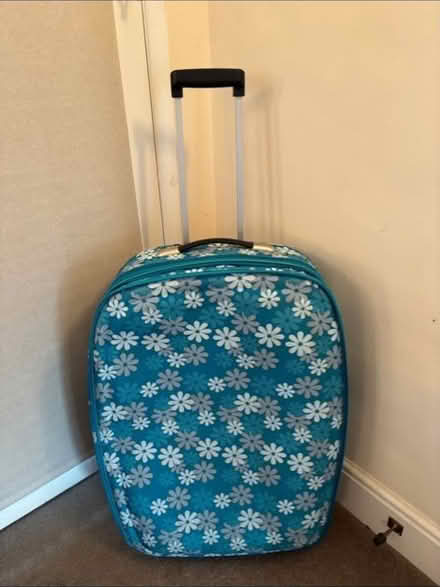 Photo of free Medium blue flower suitcase (Far Bletchley MK3) #1