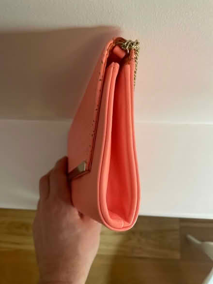 Photo of free Coral Pink Clutch Bag with Gold Chain & Perforated Detail (West Brompton SW6) #2