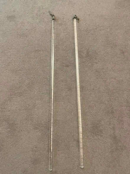 Photo of free Pair clear Perspex curtain pull rods (Pimlico SW1V) #2