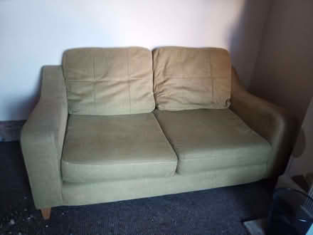 Photo of free Two-seater green sofa (Heaton Chapel SK4) #1