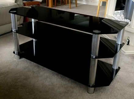 Photo of free Tv stand - black glass- 3 shelves - (Golden Cross BN27) #1