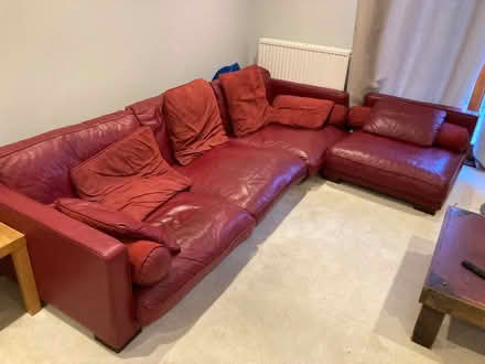 Photo of free Large red dfs leather sofa (Binfield RG42) #1