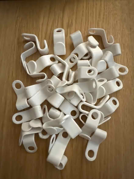 Photo of free 42 plastic coat hanger hooks (Penrith CA11) #1