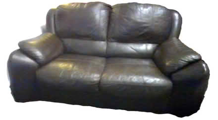 Photo of free 2 seater brown leather sofa (arnside) #1