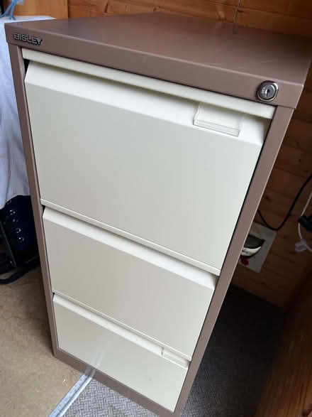 Photo of free 3 drawer Bisley lockable filing cabinet - Brown/Cream (South Cerney GL7) #1