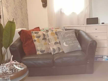 Photo of free Small seater low Brown sofa (Hampden Park BN22) #1