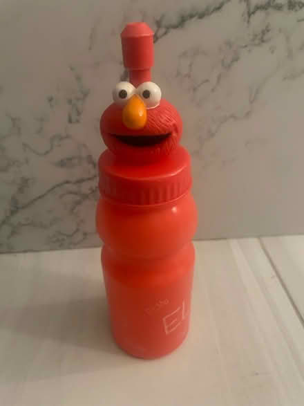 Photo of free Elmo plastic water bottle (Kennedy/16th in Markham) #1