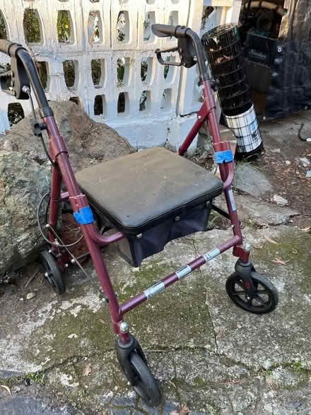 Photo of free Used walker with break and seat (20 Alvina Ave, San Rafael) #1