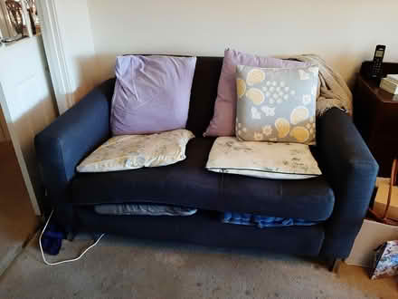Photo of free 2 seater blue sofa (not new) offer (Wyken off Blackberry Lane cv2.) #2