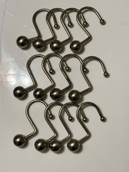 Photo of free 12 silver metal shower curtainhooks (Wilmette, Illinois) #1