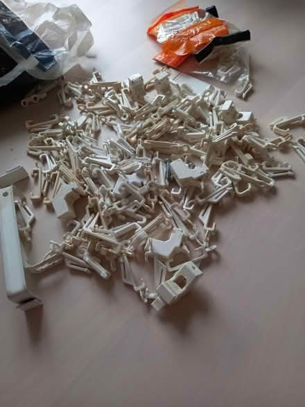 Photo of free Assortment of curtain hooks (Cranleigh GU6 7AJ) #1