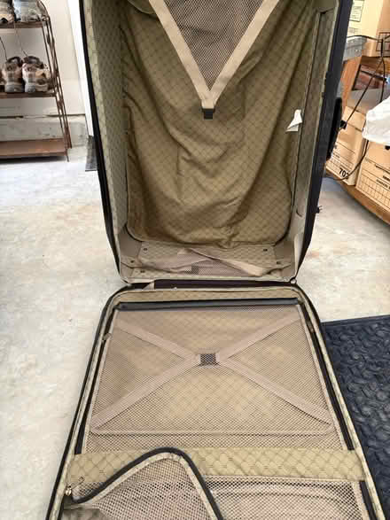 Photo of free Large suitcase (Fabyan Pkwy & Branson) #2