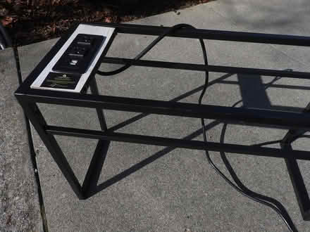 Photo of free Metal stand w/2 outlets to plug-in (near Rossmoor Pkwy) #1