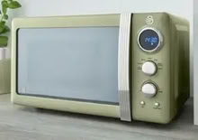 Photo of free pale green swan microwave (Moor Allerton LS17) #1