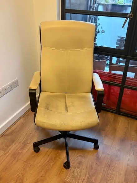 Photo of free Upholstered swivel chair (De Beauvoir Town N1) #1