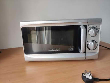 Photo of free Grey microwave (working) (Gloucester) #2