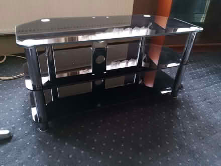 Photo of free Black glass TV stand (Harringay N4) #1