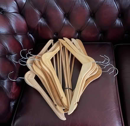 Photo of free 11 wooden coat hangers (Rednal B45) #1