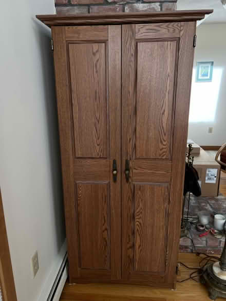 Photo of free Tall wood cabinet (Groton near Shaw’s) #2
