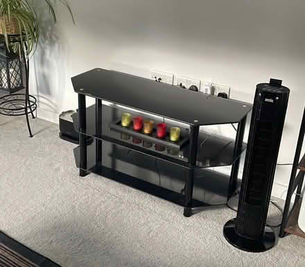 Photo of free Black glass tv stand (Chineham RG24) #1