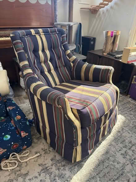 Photo of free Upholstered swivel rocker (Zaferia) #1
