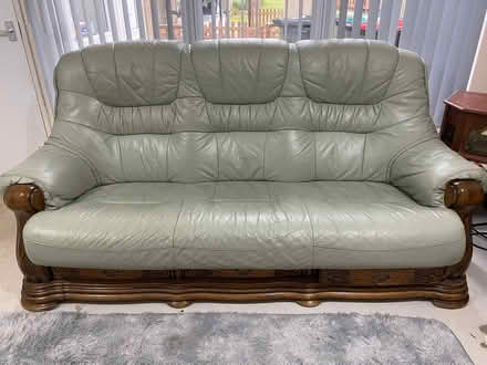 Photo of free Green and wood settee will need collecting. (Far Bletchley MK3) #1