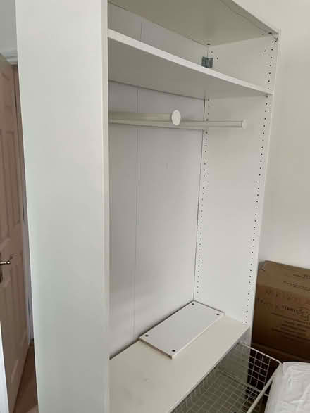 Photo of free Tall white wardrobe / storage unit - shelves + hanging rails (Dartmouth Park N19) #1