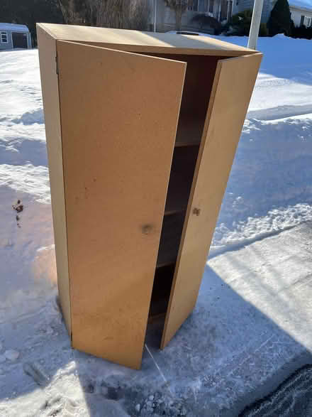 Photo of free Flakeboard Cabinet (Succasunna, NJ) #1
