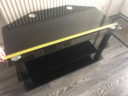 Photo of free Tv stand 95cm wide black toughened glass (Denton M34) #1