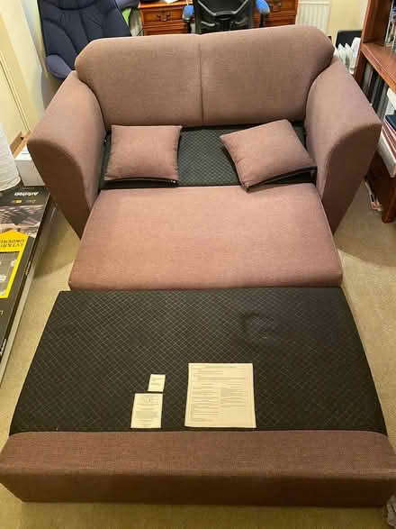 Photo of free Brown 2 seater sofa bed (Ashtead) #1