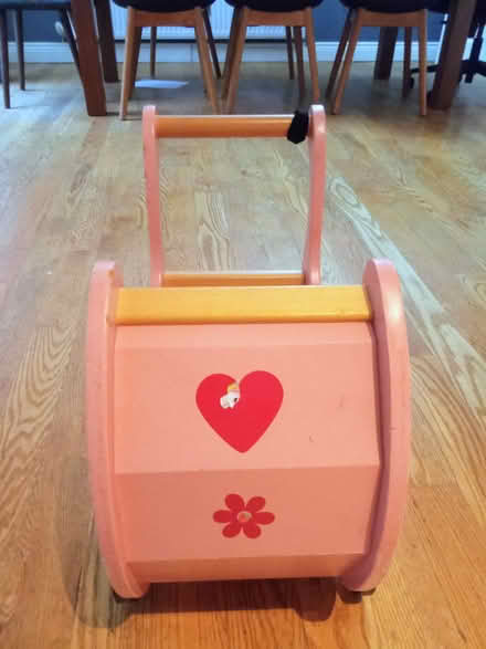 Photo of free Pink wooden toy pram (Blackrock, Co Dublin) #1