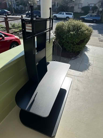 Photo of free Black TV mount console (North Berkeley) #2