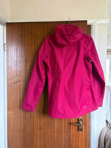 Photo of free Dark pink hard shell coat (Dacre CA11) #1