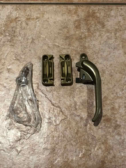 Photo of free Titon locking window handle - new with keep & keys (Wood Farm OX3) #1