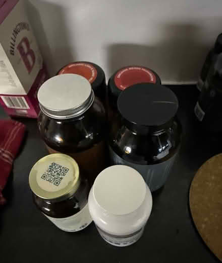 Photo of free Brown and violet glass jars (ha28qz) #1