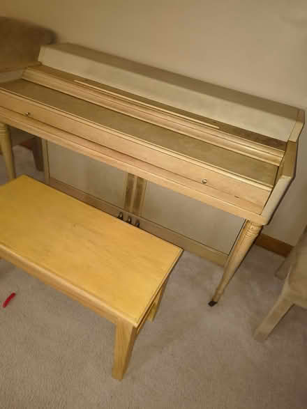 Photo of free Piano and bench with books (South Lorain) #1