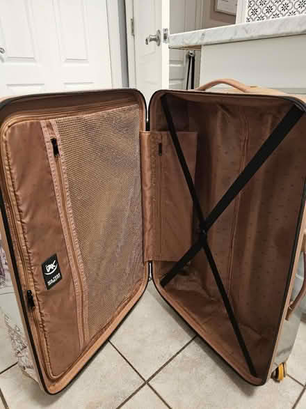 Photo of free Large checked suitcase (Raritan Township/Ringoes) #3