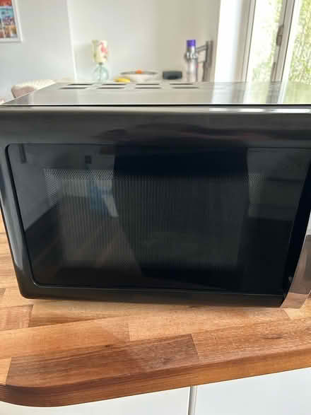 Photo of free Black microwave (Banstead SM7) #1