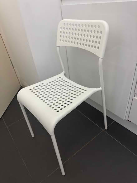 Photo of free 4x plastic white chairs (SE13) #2